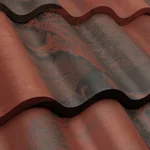 Close-up view of red and dark gray wavy roof tiles arranged in a repeating pattern.