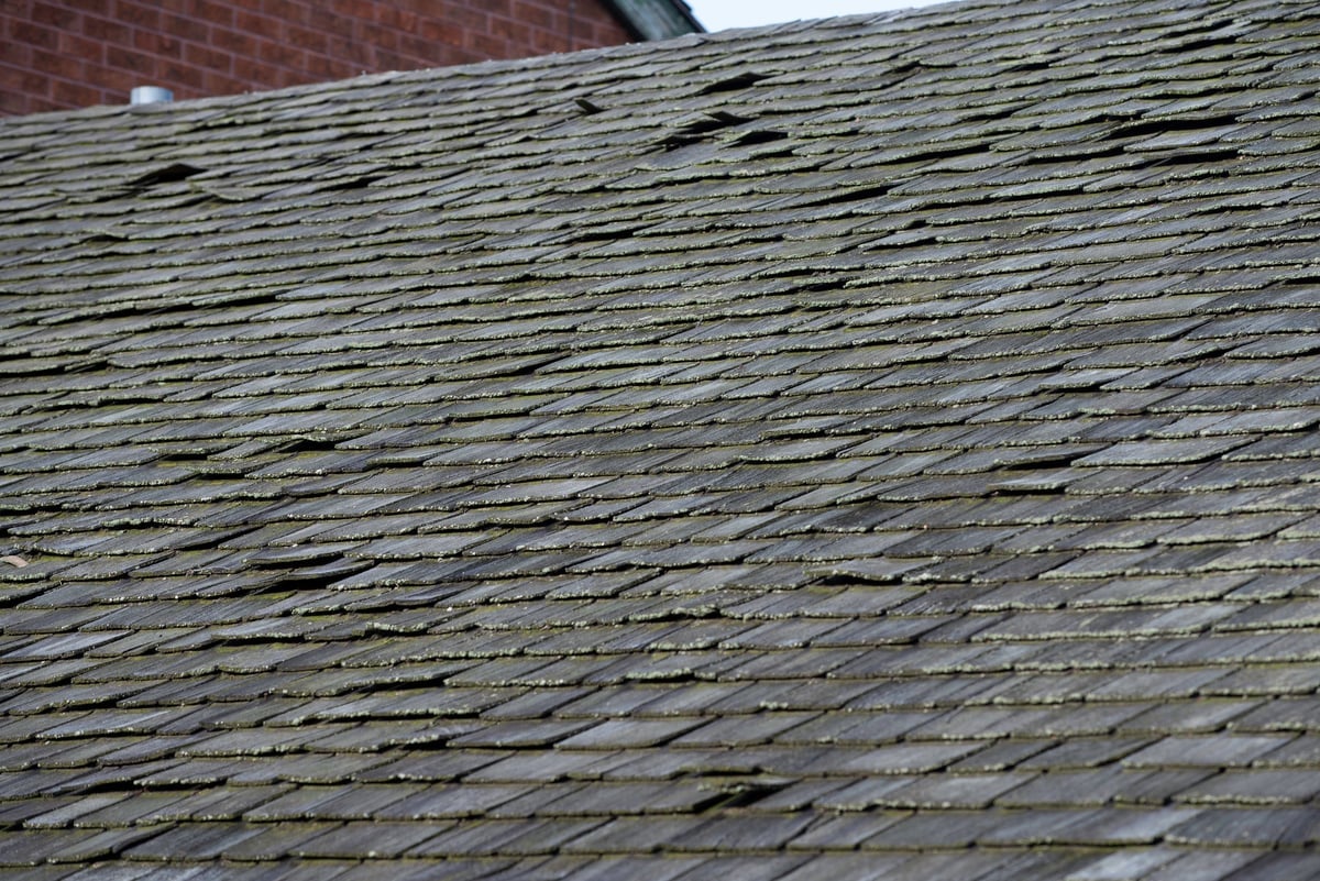 metal roof over shingles