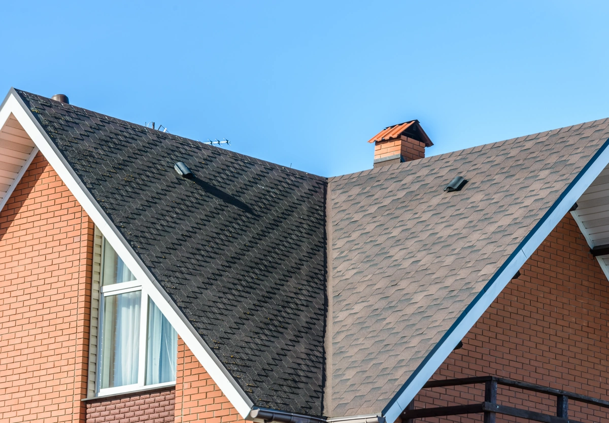 asphalt shingle roof on a brick house
