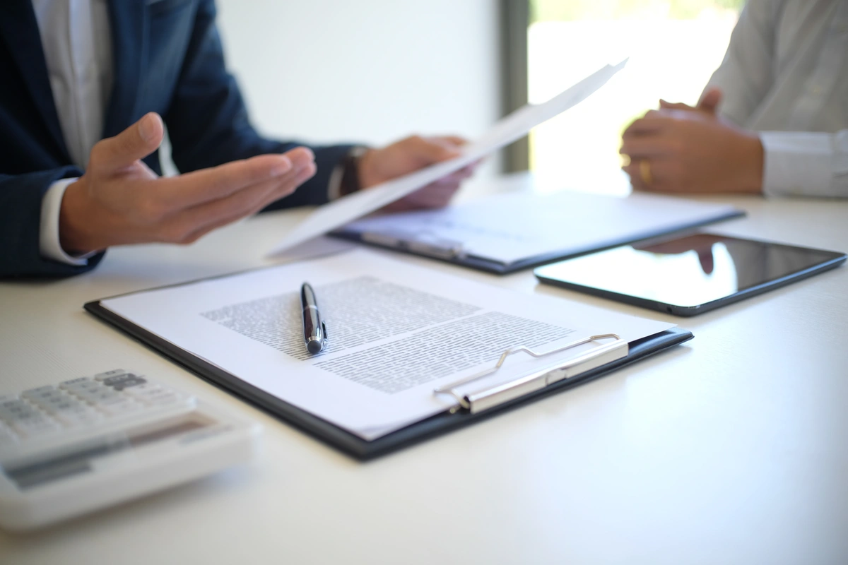 close up to insurance documents on table