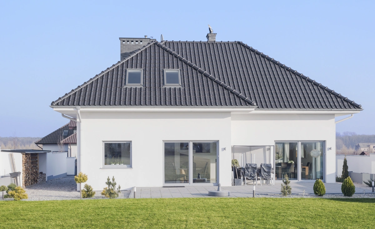 modern house with metal tile roof