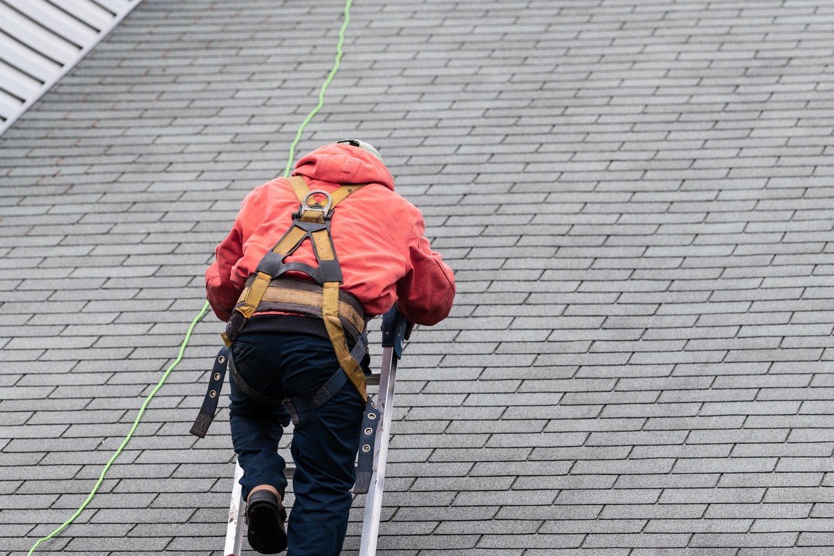 roofer on ladder