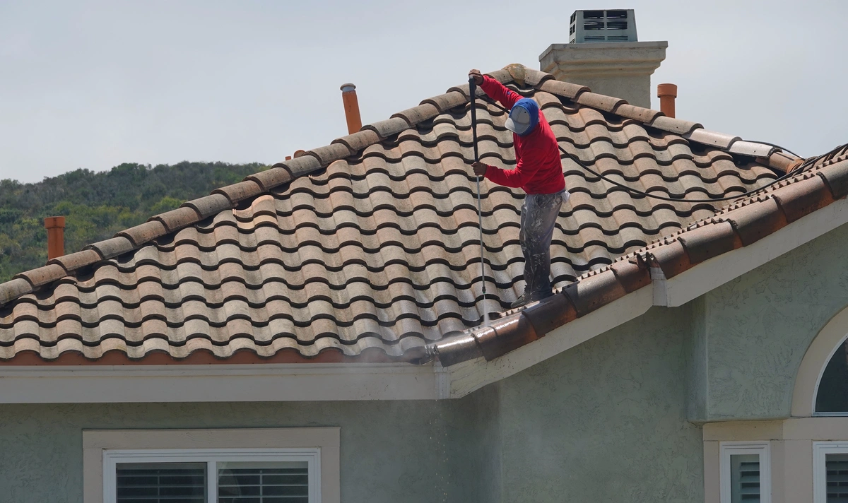 working on a tile roof