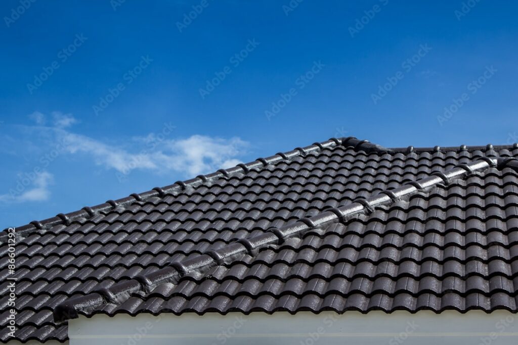 metal tile roofing against blue sky