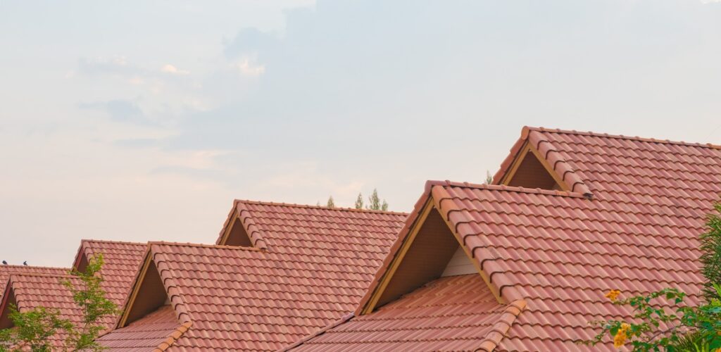 row of residential houses with clay tile roofing