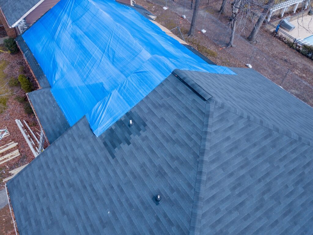 closeup residential roof tarp