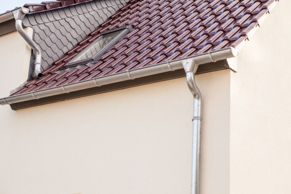 types of gutters two gutters red metallic roof with beige walls